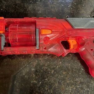 Red and Orange nerf gun and is a toys are us exclusive